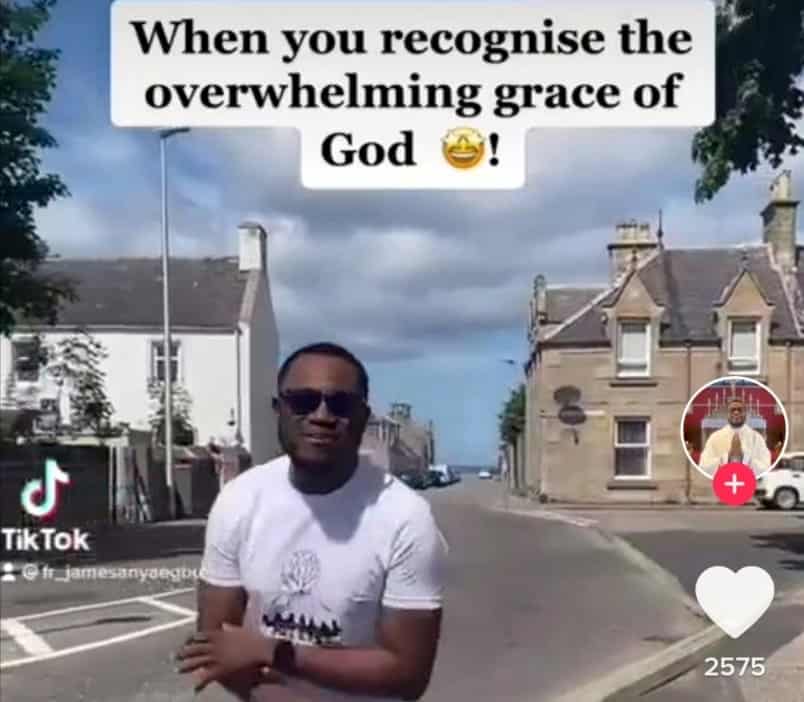 Nigerian Priest Drawing Attention